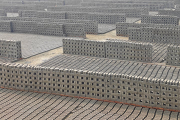 A bunch of bricks that are laying on the ground